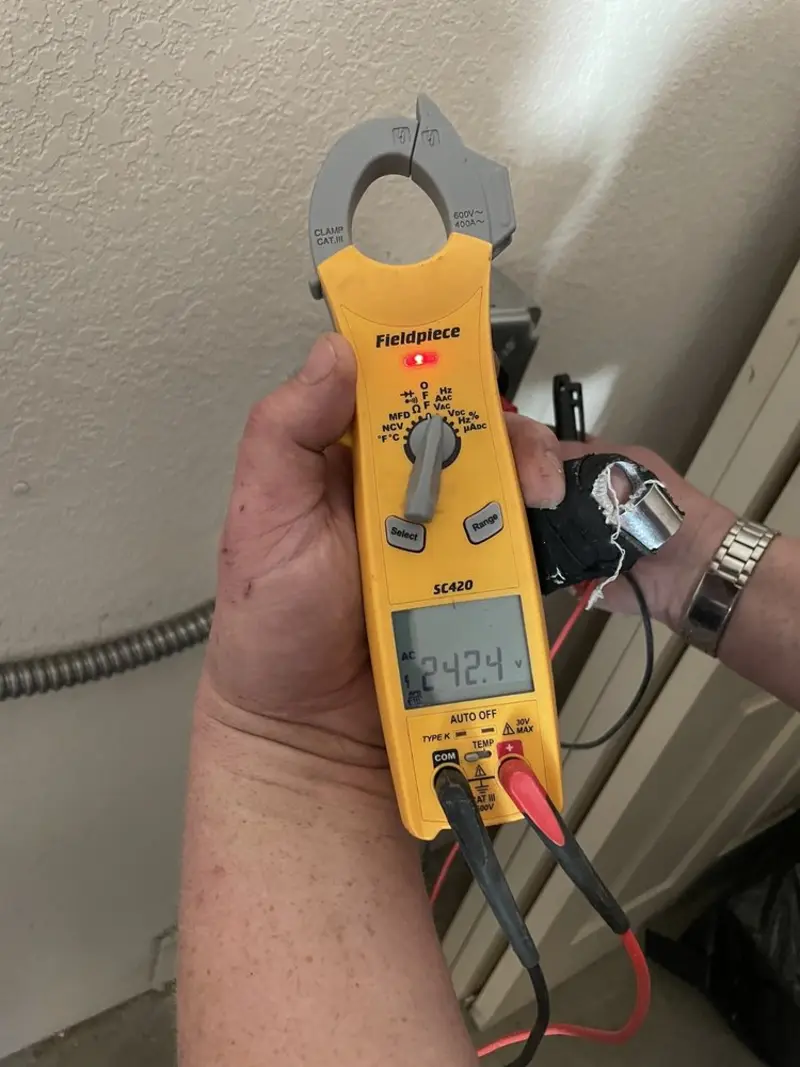 Voltage testing with clamp meter during Aluminum Wiring Replacement in Huntsville
